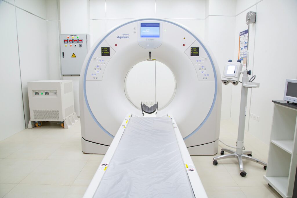 CT Scan in Howrah – Accurate, Fast & Reliable Imaging High-quality image of a modern MRI scanner in a sterile hospital room, ready for use.
